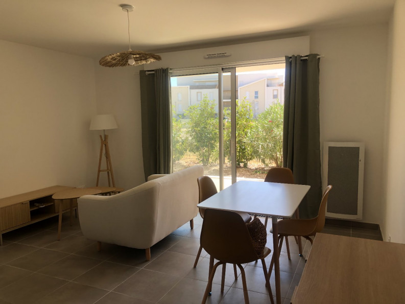 location Appartement en rez de jardin Sauvian - Photo 2