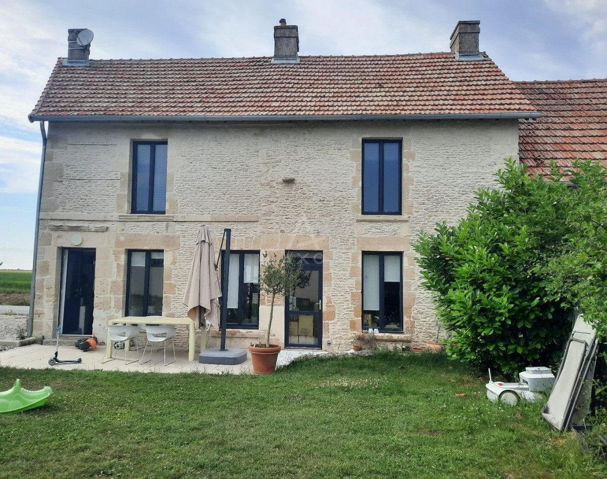 location Maison Rots - Photo 1