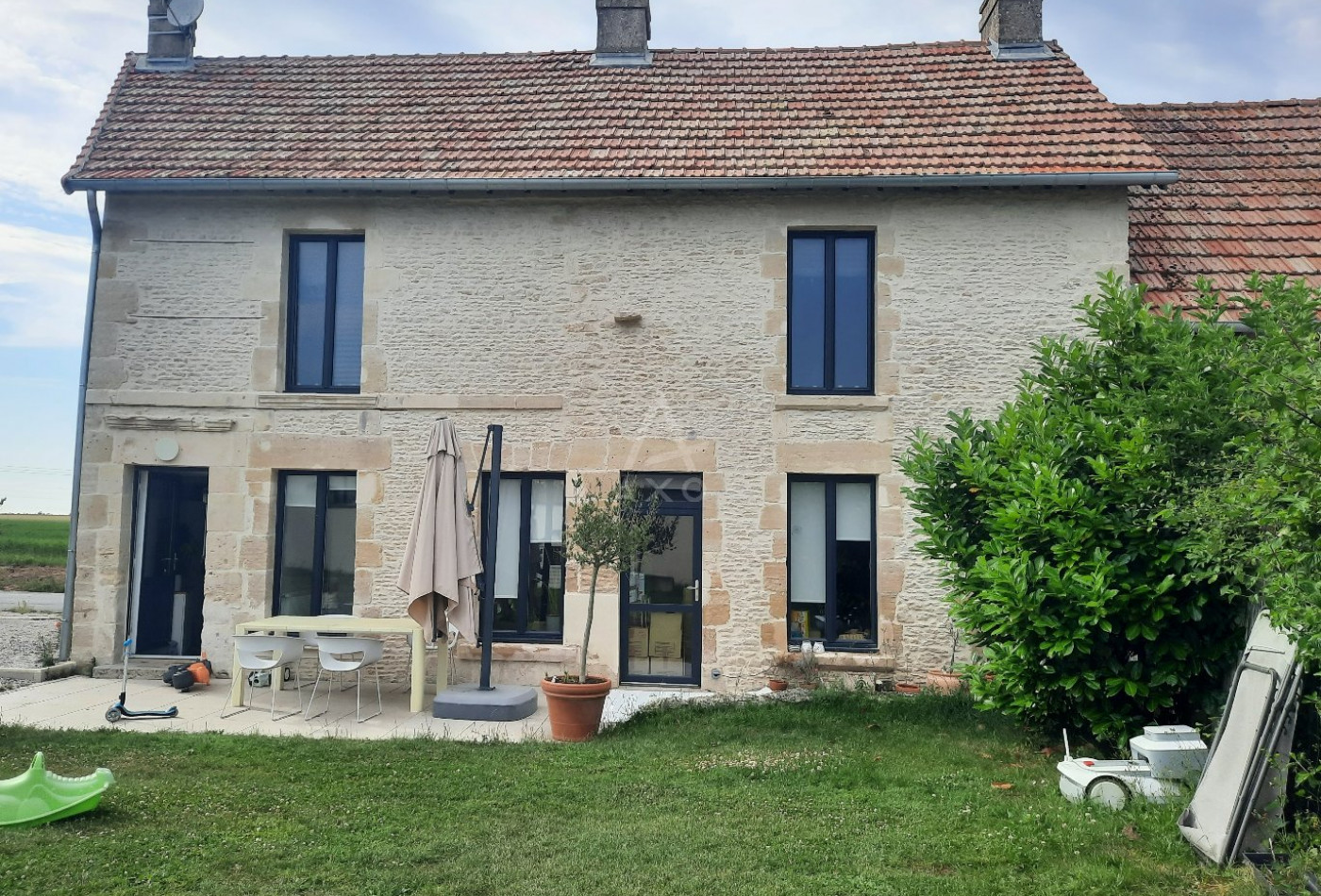 location Maison Rots - Photo 1