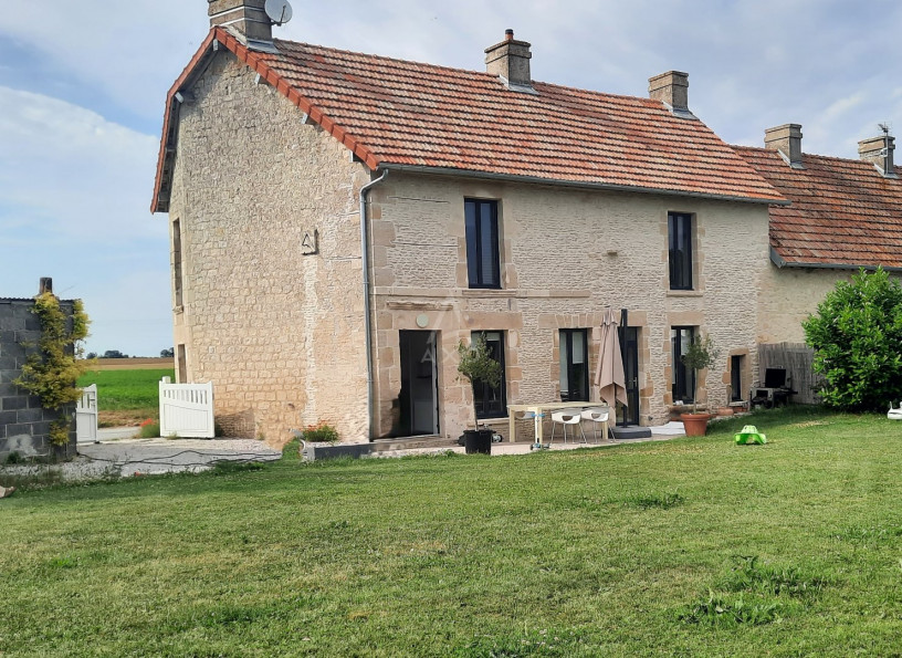 location Maison Rots - Photo 1