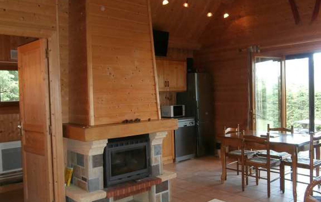 en location saisonnière Chalet en bois Chastreix - Photo 8