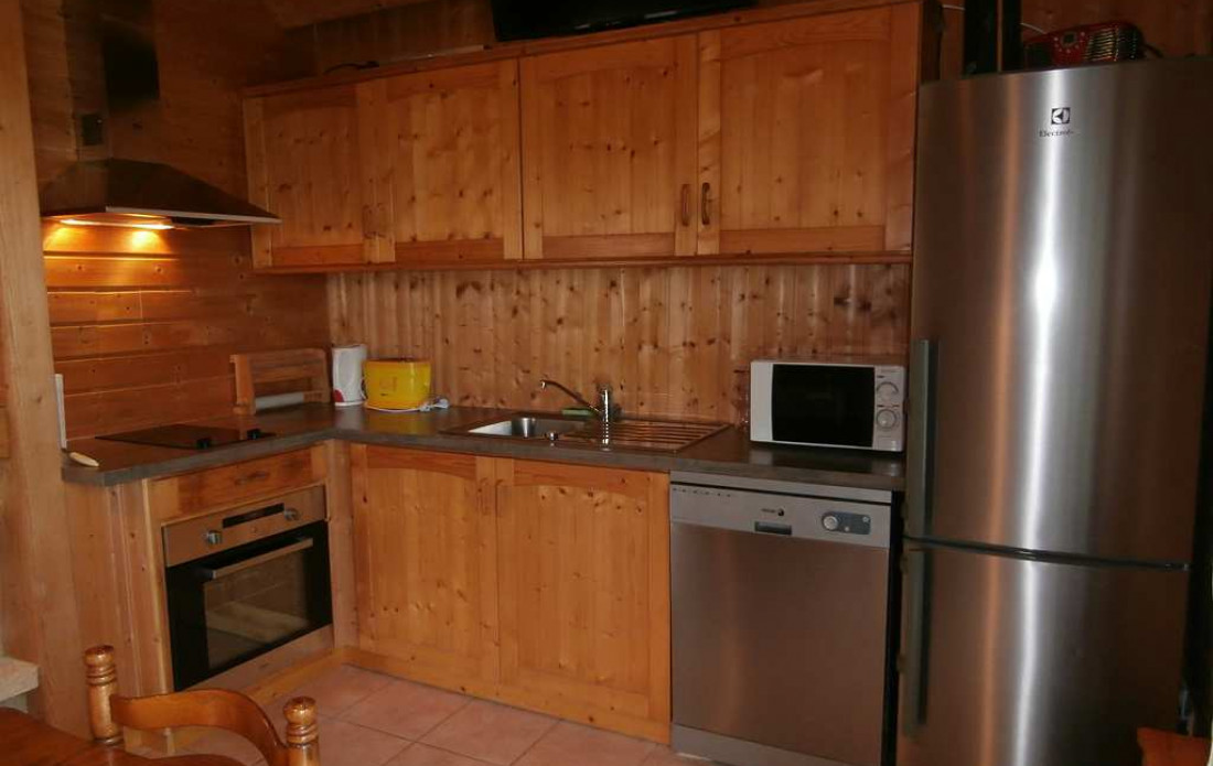 en location saisonnière Chalet en bois Chastreix - Photo 10