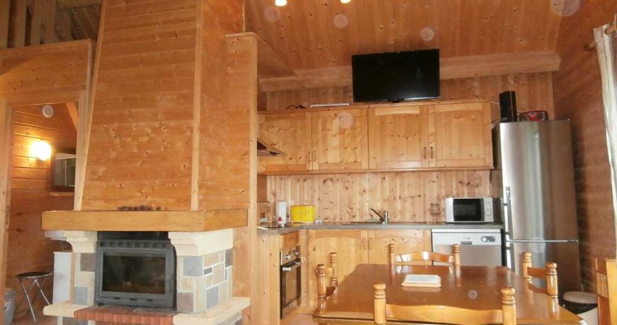 en location saisonnière Chalet en bois Chastreix