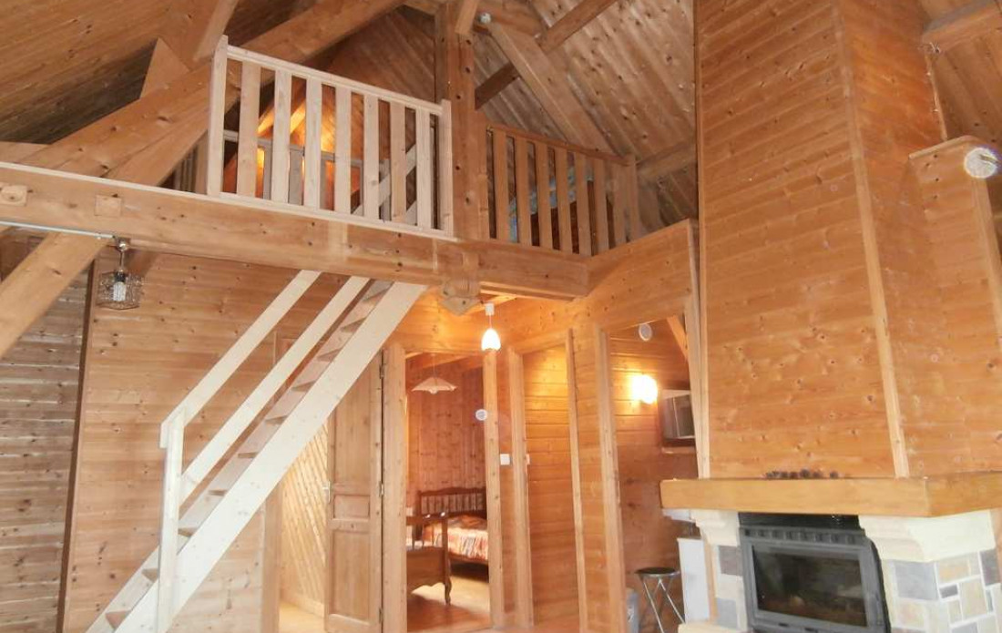 en location saisonnière Chalet en bois Chastreix - Photo 9