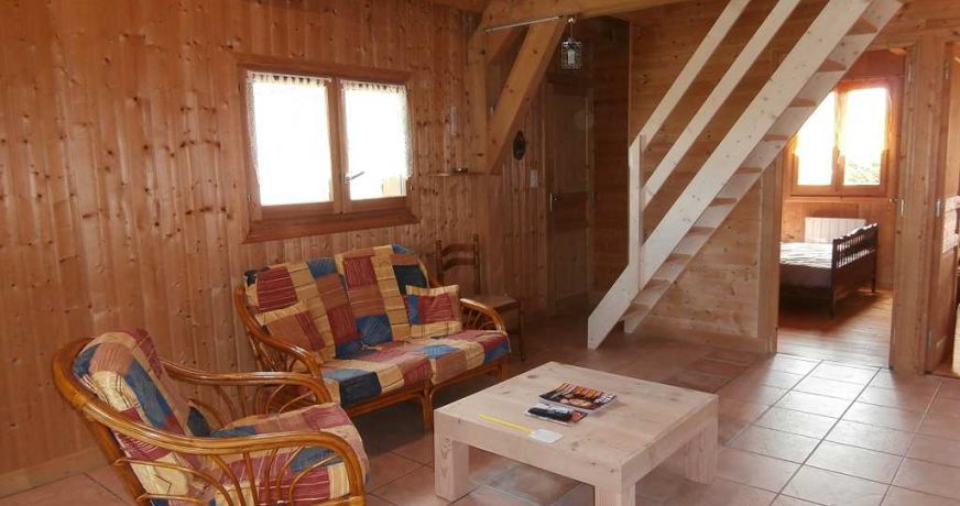 en location saisonnière Chalet en bois Chastreix